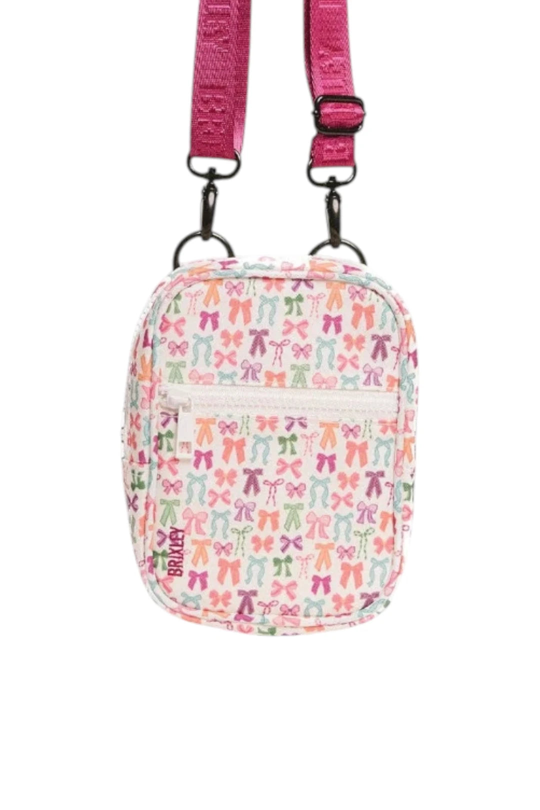 A small crossbody bag with a white background covered in a colorful pattern of bows in pink, orange, green, and purple. It features a bright pink adjustable shoulder strap with black metal hardware.
