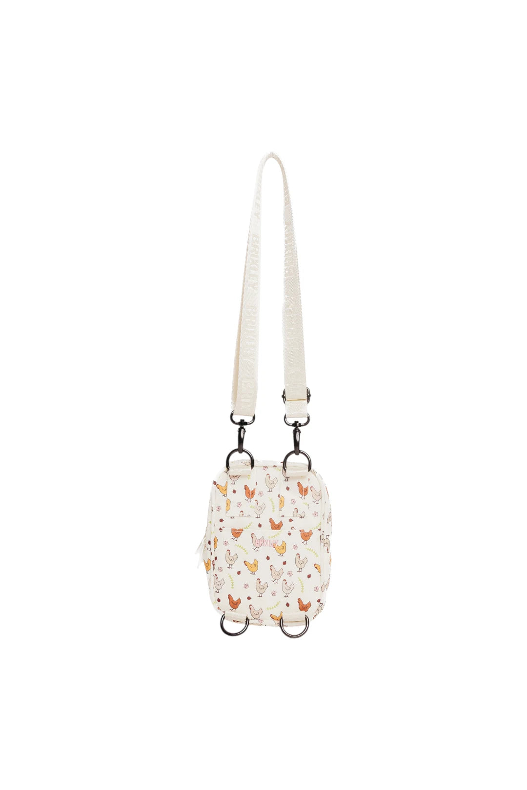 A small crossbody bag with a white strap and a white body covered in a colorful pattern of chickens, shown against a plain white background.