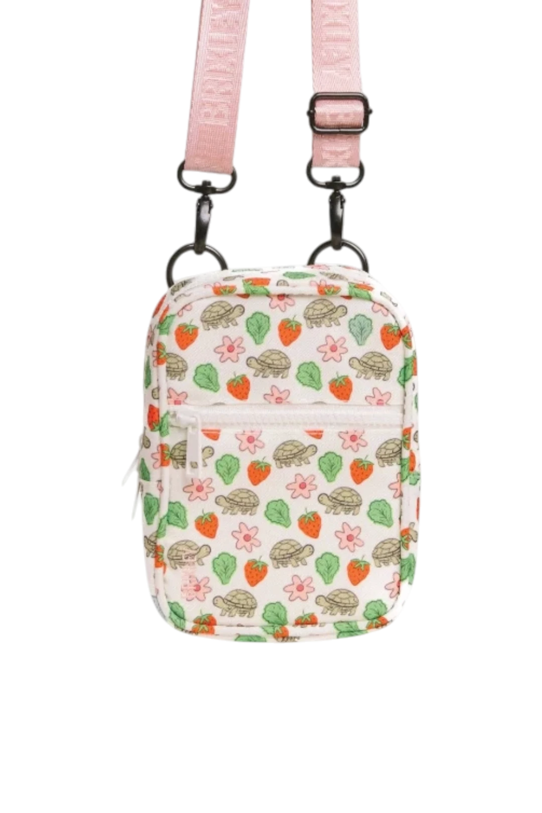 A small crossbody bag with a pink adjustable strap and a white body covered in a colorful pattern of sea turtles, strawberries, and leaves. The bag is shown against a plain white background.