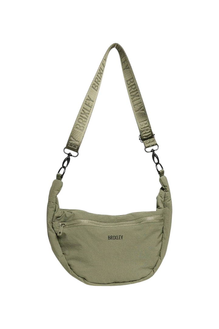 An olive green semi-circular crossbody bag with a matching branded webbing strap, shown against a plain white background.