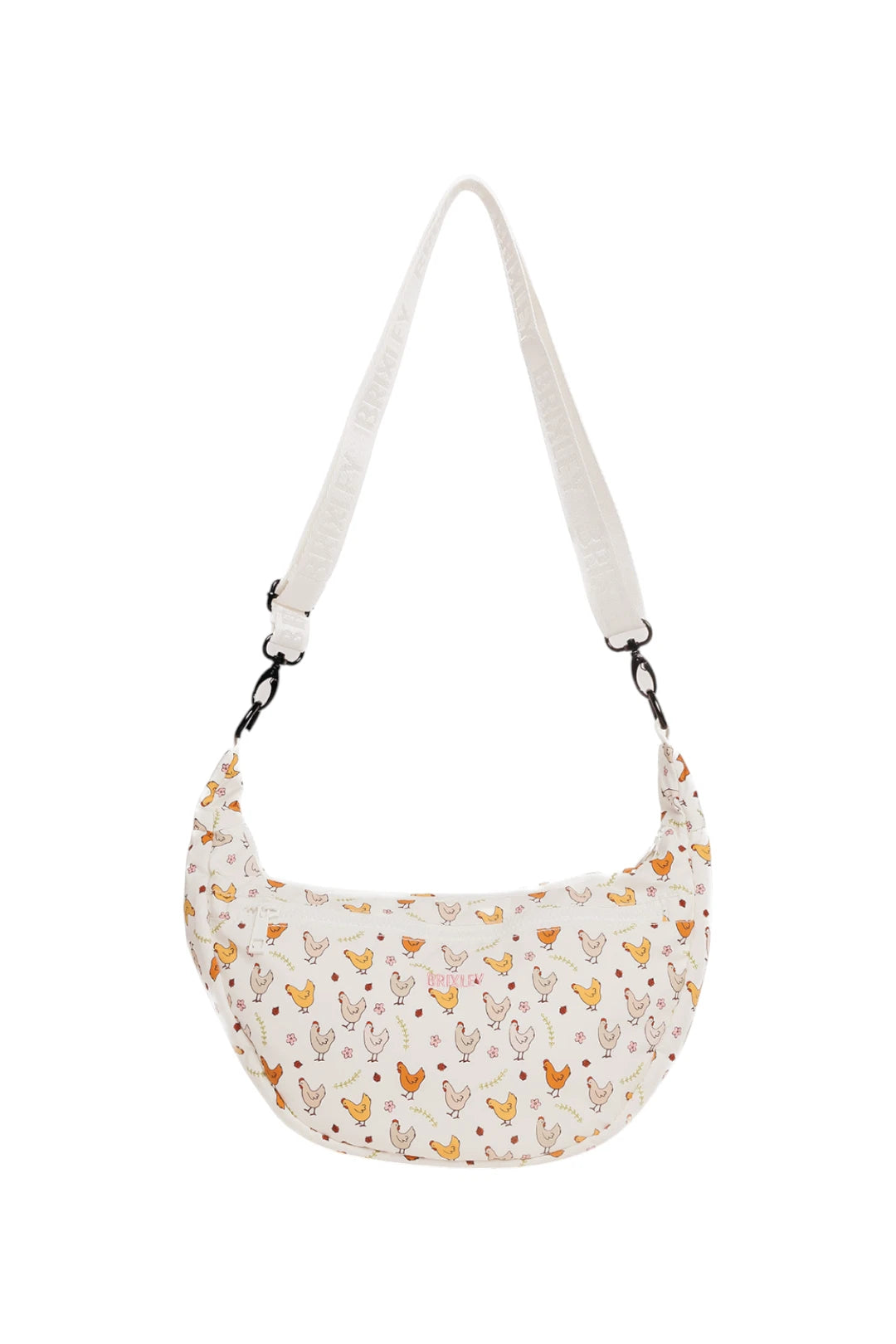 A crescent-shaped shoulder bag with a white strap and a white body covered in a pattern of small chickens, shown against a plain white background.
