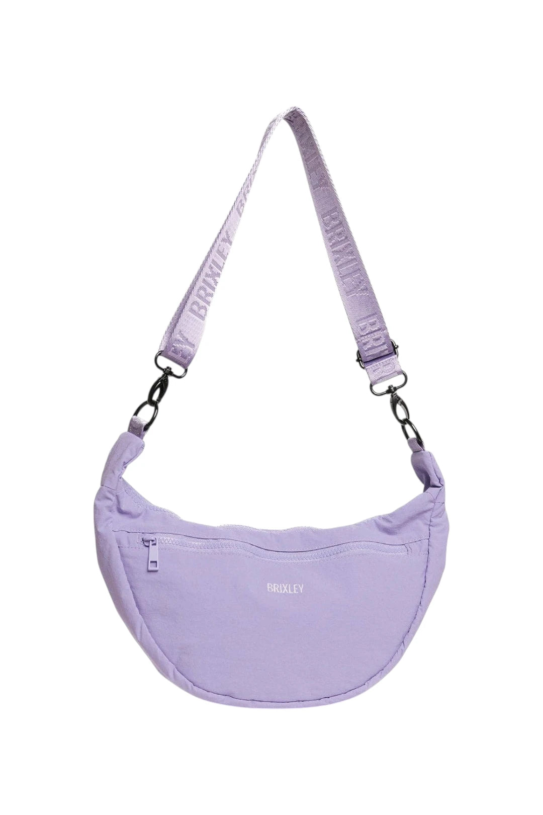 A light purple crescent-shaped shoulder bag with a matching adjustable strap featuring the brand name 'BRIXLEY' printed repeatedly. The bag has a small front zip pocket and a subtle BRIXLEY logo on the front, set against a plain white background.