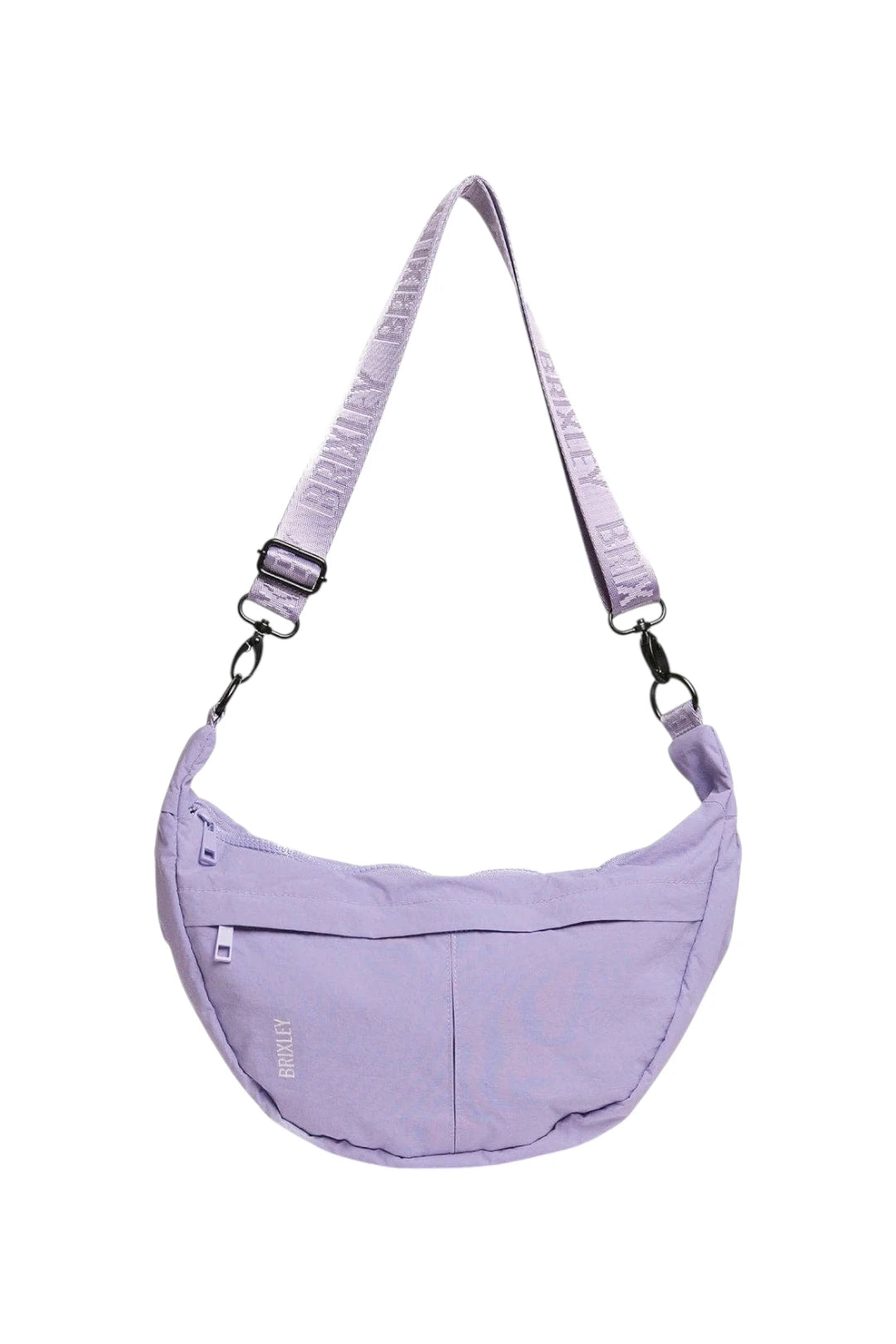 A light purple crescent-shaped shoulder bag with an adjustable, zippered strap, featuring a front zip pocket and a small vertical 'BRIXLEY' brand label, shown against a plain white background.