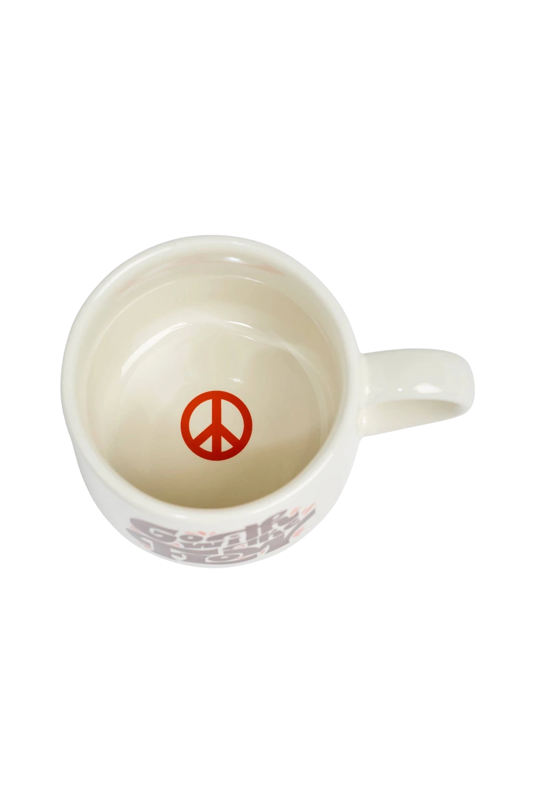 An off-white ceramic coffee mug shown from a top-down view, featuring a red peace sign printed inside the cup and a red and gray graphic on the side.