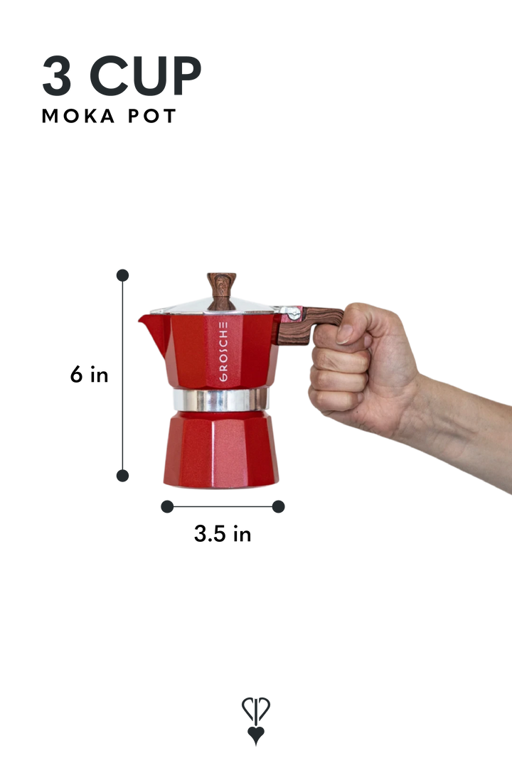 A red 3-cup moka pot with dimension labels showing 6 inches tall and 3.5 inches wide, held by a person's hand on a white background with text reading '3 CUP MOKA POT'.